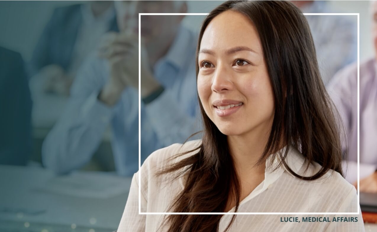 Woman smiling in a meeting for Cytokinetics project by XDS - Bringing a late-stage biopharmaceutical company to life.